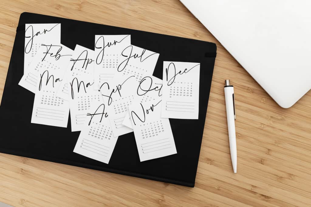 7 Simple Steps for a Successful Goal Setting Process. Printout of calendar months.