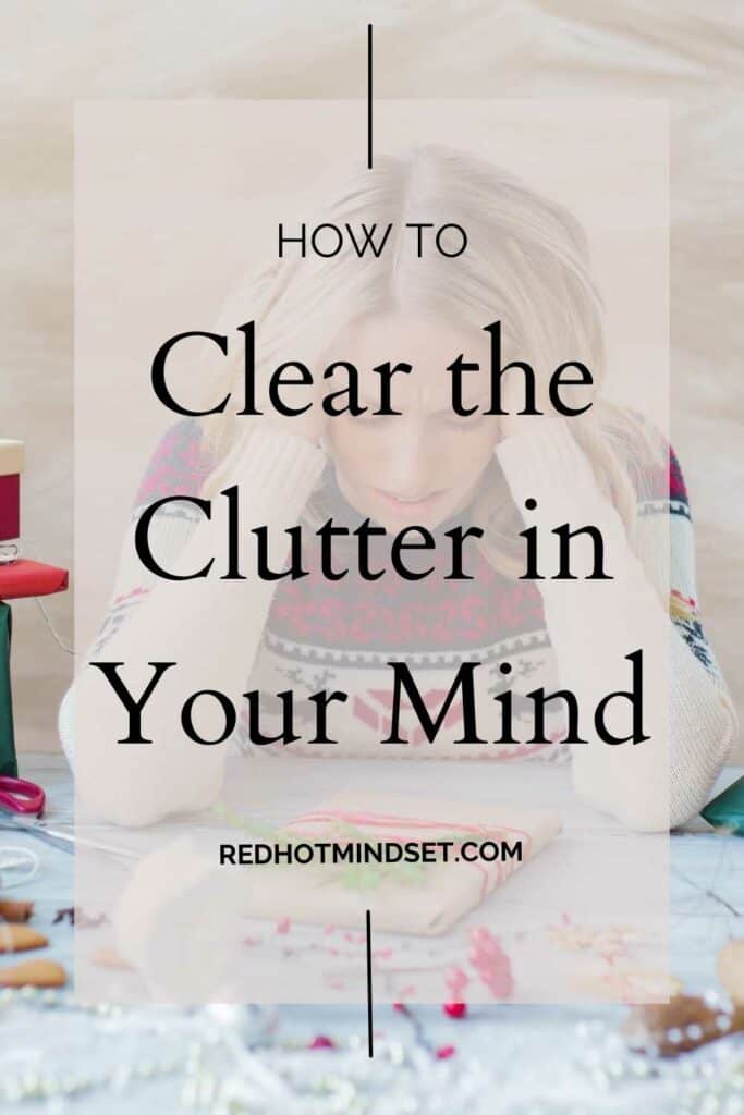 underlay picture of woman sitting at the table with a ton of clutter with hands on her face in frustration titled how to clear the clutter in your mind